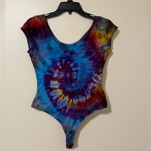 Blue and purple tie dye bodysuit.